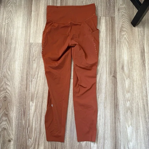 SOLD ***Lululemon Fast and free high rise tight leggings. Color Dark terracotta - Picture 2 of 11